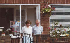 Mary and Bob outside their Bed & Breakfast.